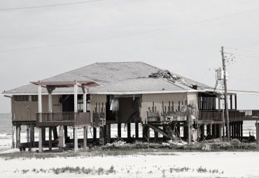 wind damage - spray foam can help prevent uplift to Denton roofs